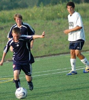 Golden Goal club soccer players compete.