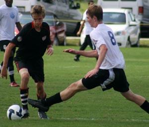 Boys club soccer players compete in a club soccer tournament.