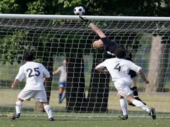 Boys club soccer players compete in a club soccer tournament.