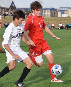 Boys club soccer players compete in a club soccer tournament.